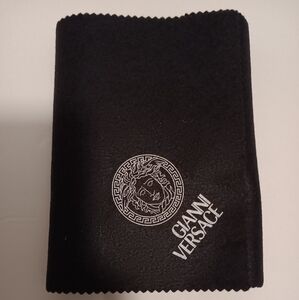 Gianni versace black agenda with dust cloth  see pics and description sold as is